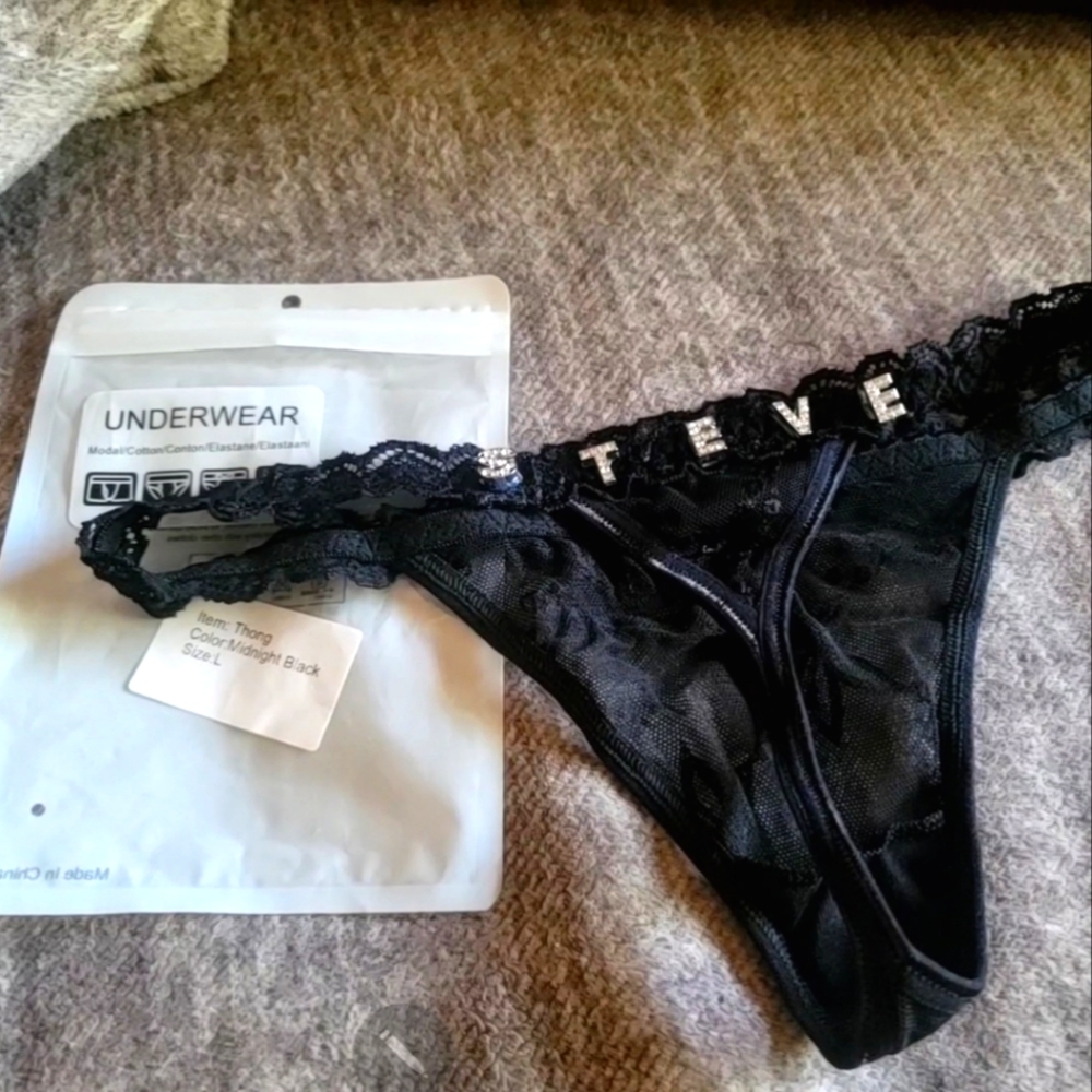 Brand new black thong with "Steve" on tge back